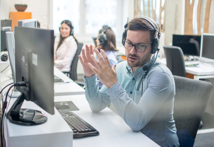 Call center operator wearing a headset.